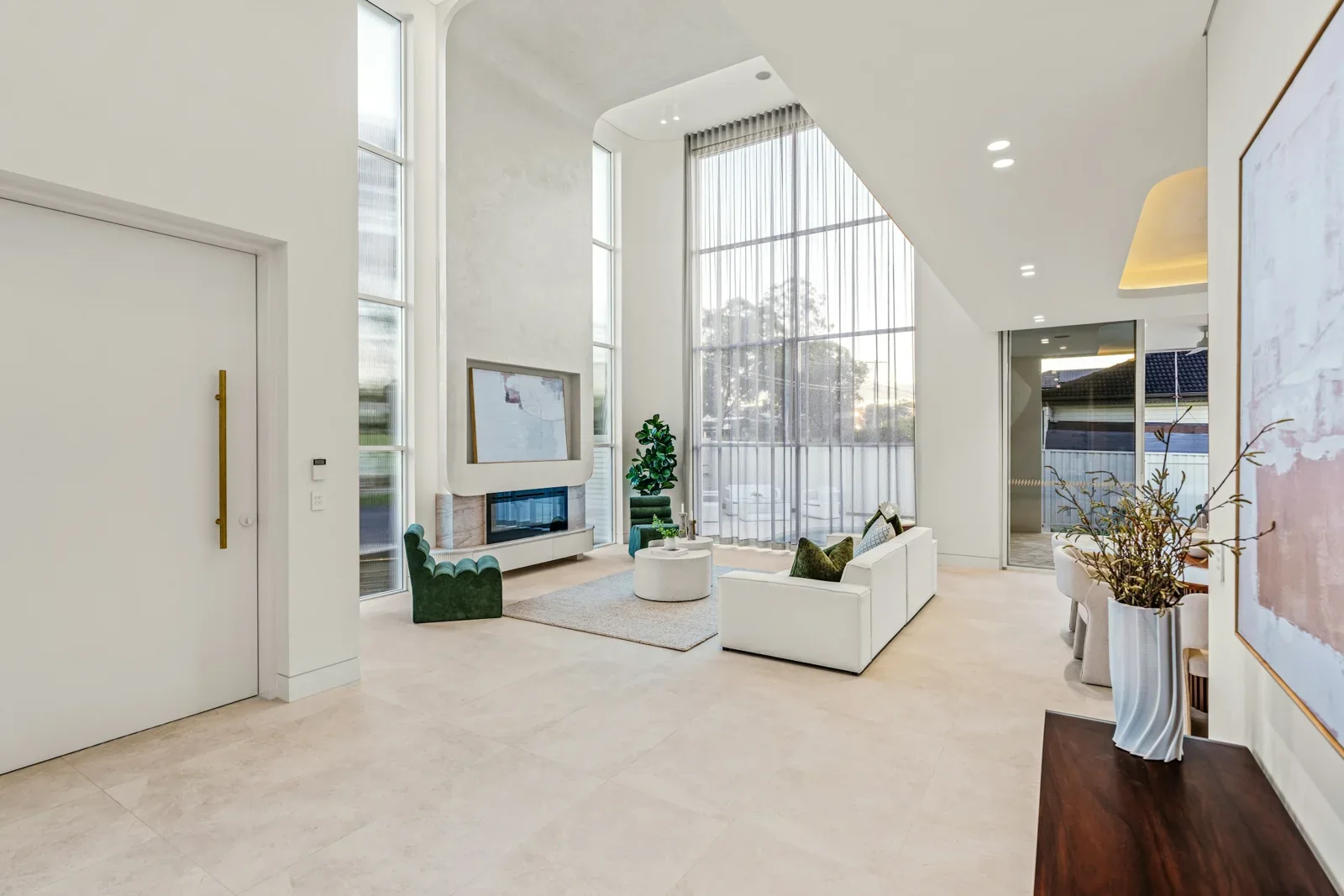 Contemporary living space with floor-to-ceiling windows